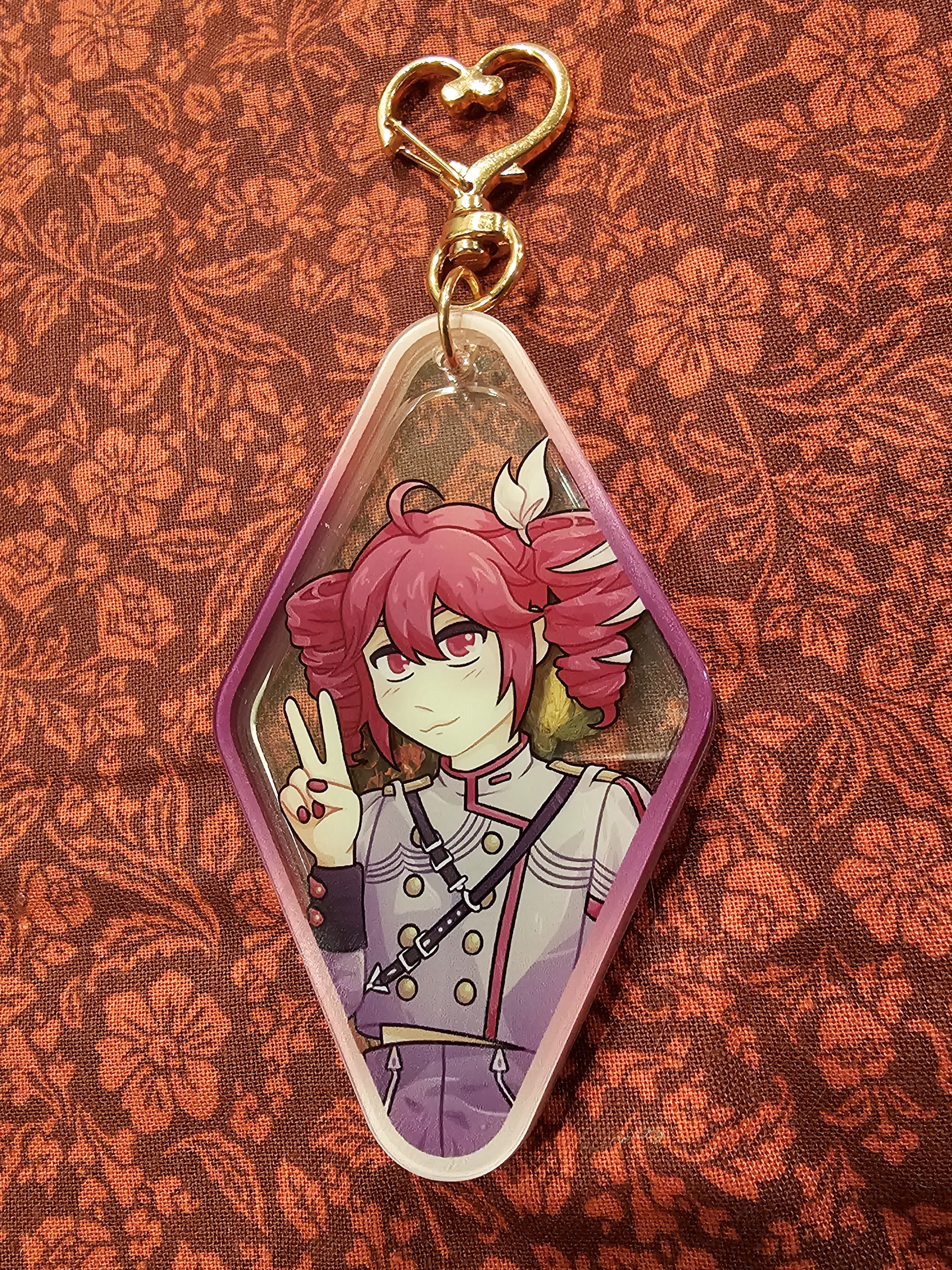 Same charm as before, with the two pieces overlayed on top of each other.