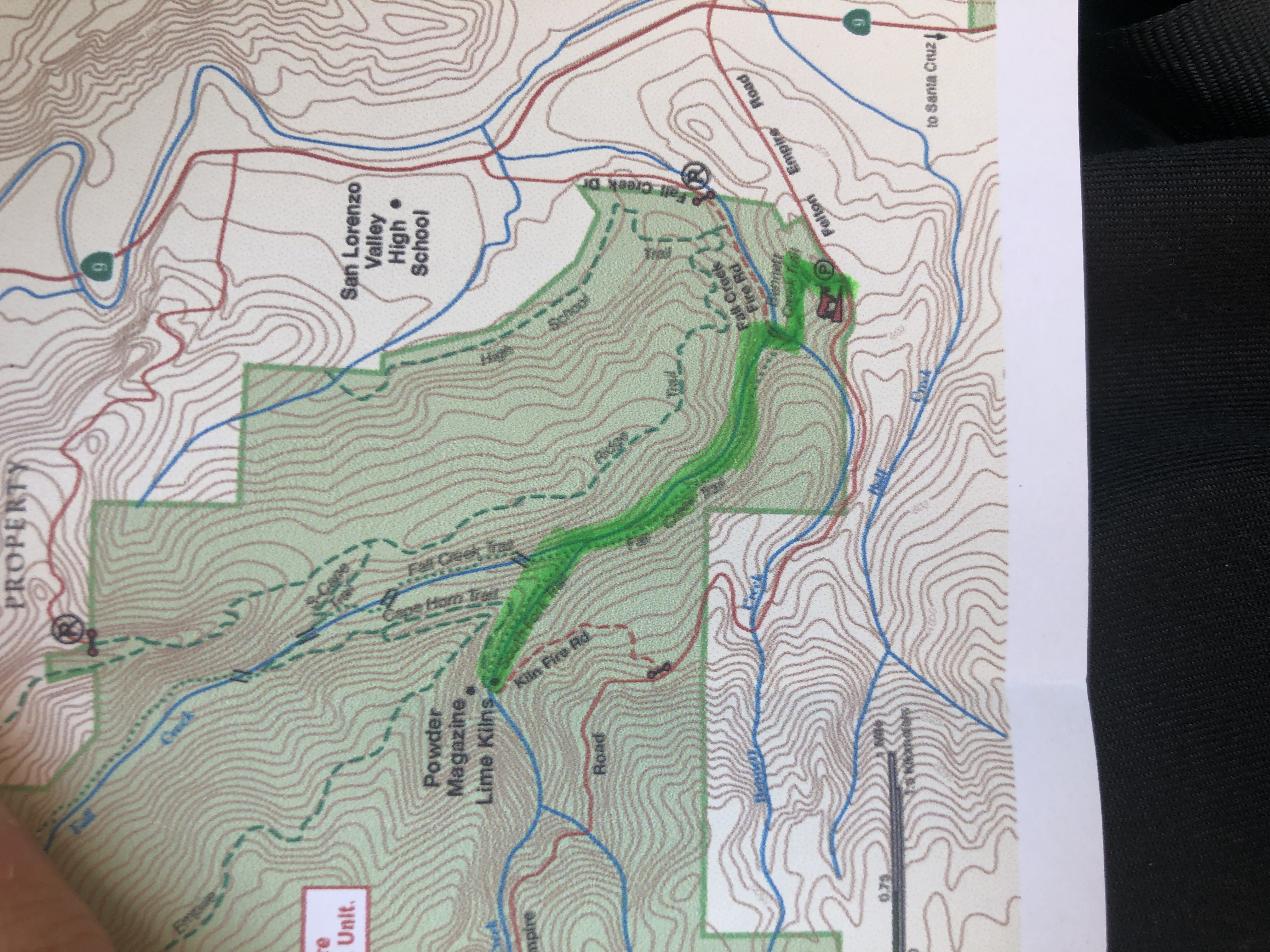 a printed map with the lime kiln hike highlighted.