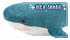 a stamp of an ikea shark plush