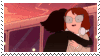 a gif stamp of simon and betty from adventure time. The gif shows betty embracing simon and jumping into his arms, where he spins her around looking delighted.