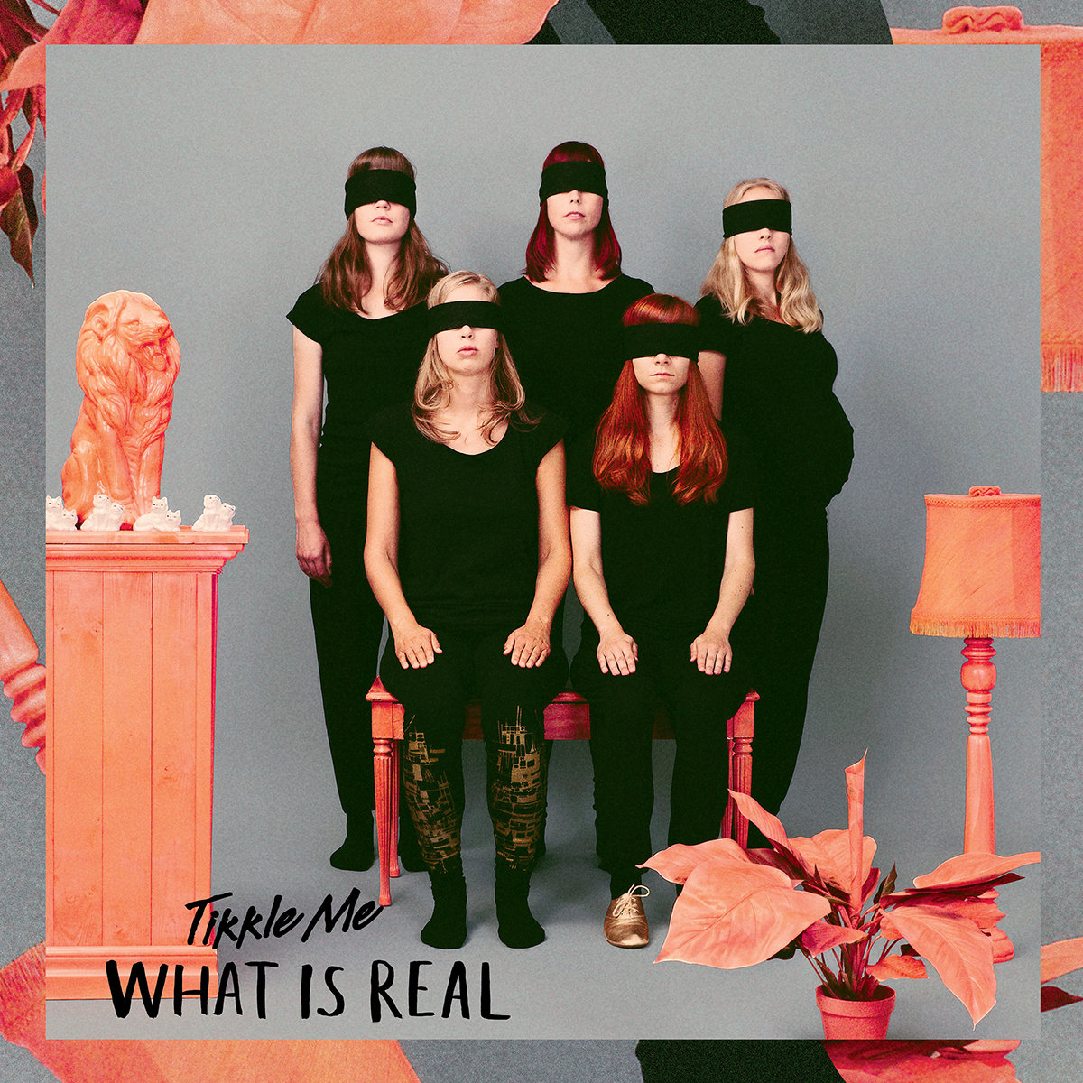 THE ALBUM COVER OF WHAT IS REAL BY TIKKLE ME.