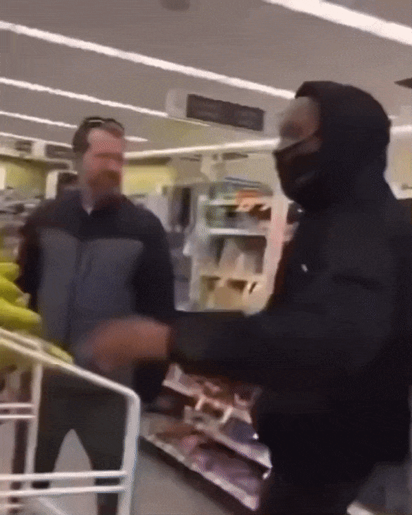 A GIF OF SOMEONE THROWING A BANANA AT ANOTHER PERSON.