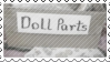 a stamp of a box reading 'doll parts'
