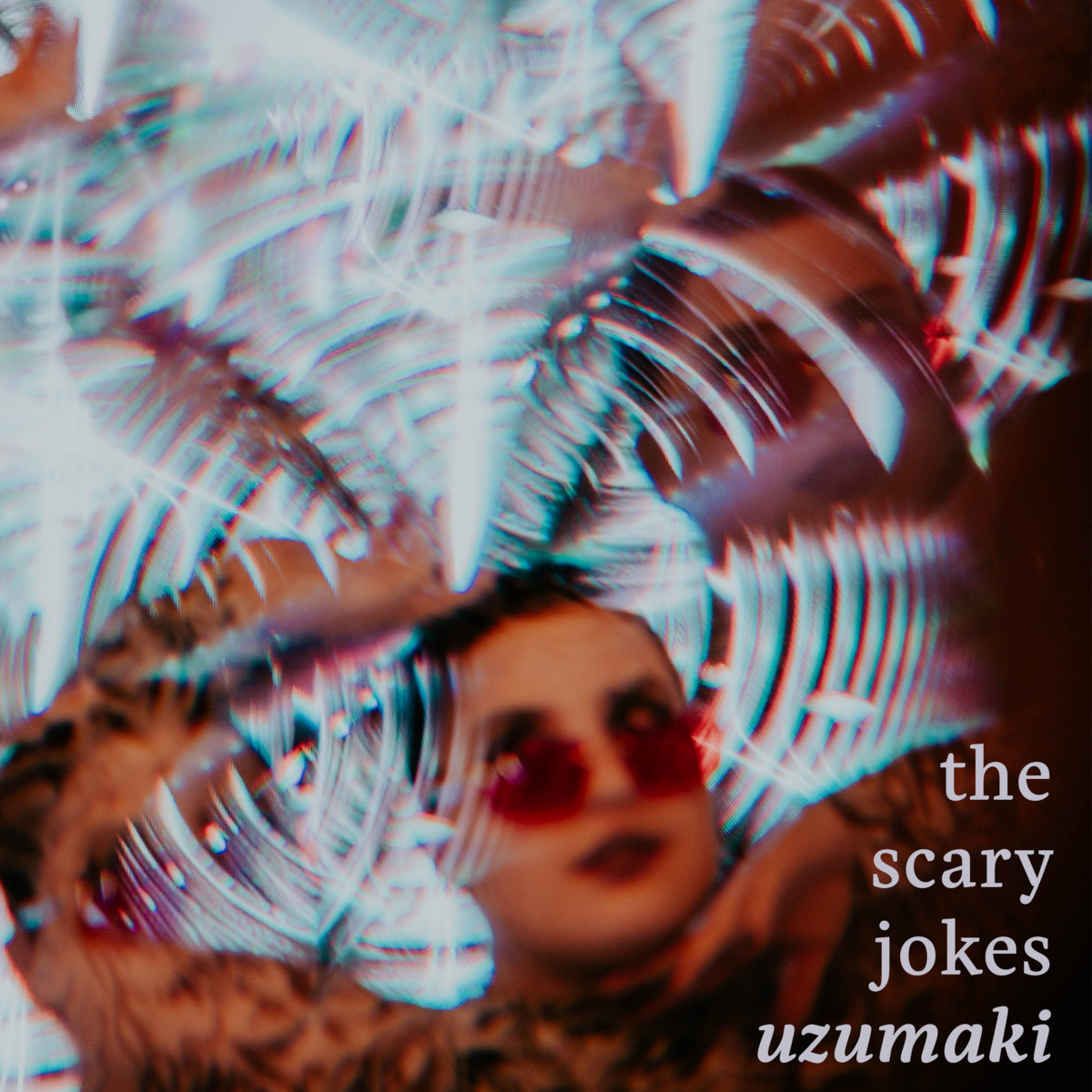 THE ALBUM COVER FOR UZUMAKI BY THE SCARY JOKES.