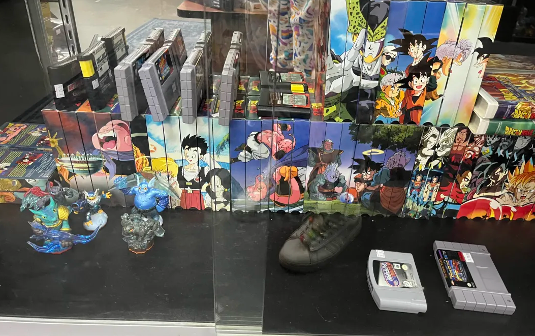 Big collection of Dragon Ball Z VHS tapes, locked in a glass case
