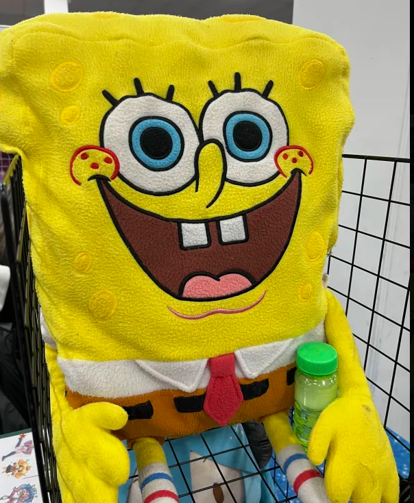 SpongeBob plushie with a bottle of bubbles