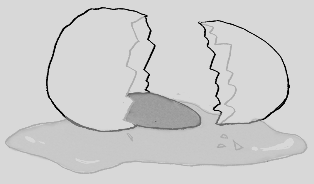 A broken egg, cracked in two. The yolk is oozing out of the bottom half. The whole thing is orientated sideways, lying on the ground.