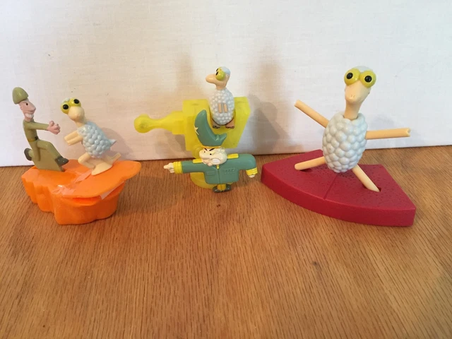 A picture of 3 of the 4 toys (General Specific Helicopter missing) out of their packaging.