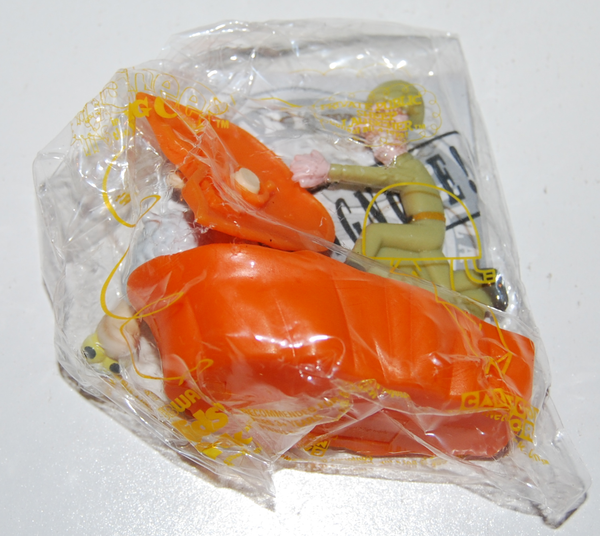 A picture of the Private Public Sheep Launcher toy, wrapped in its original platic packaging.