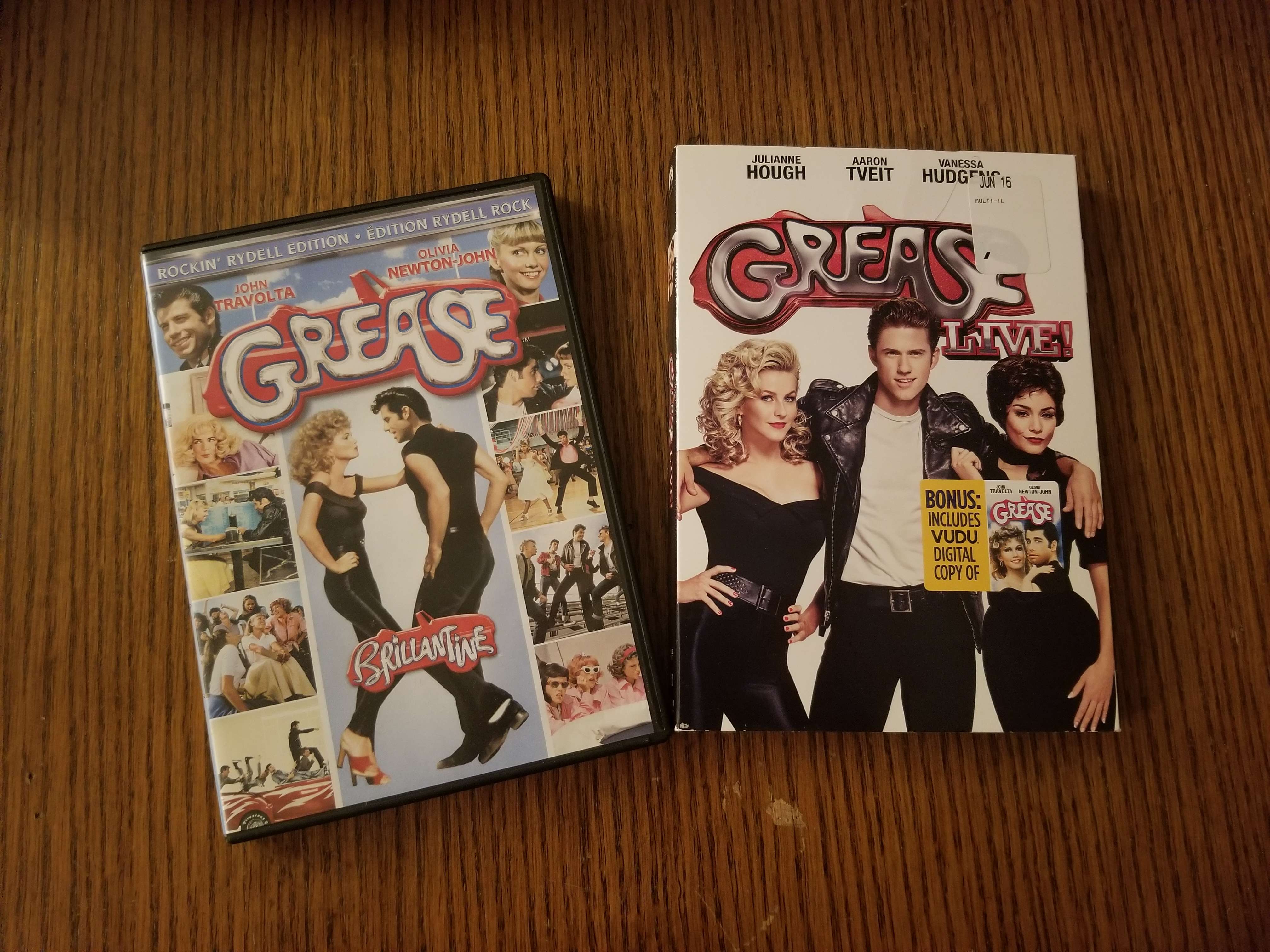 Two DVDs; Grease: Rockin Rydell Edition and Grease Live.