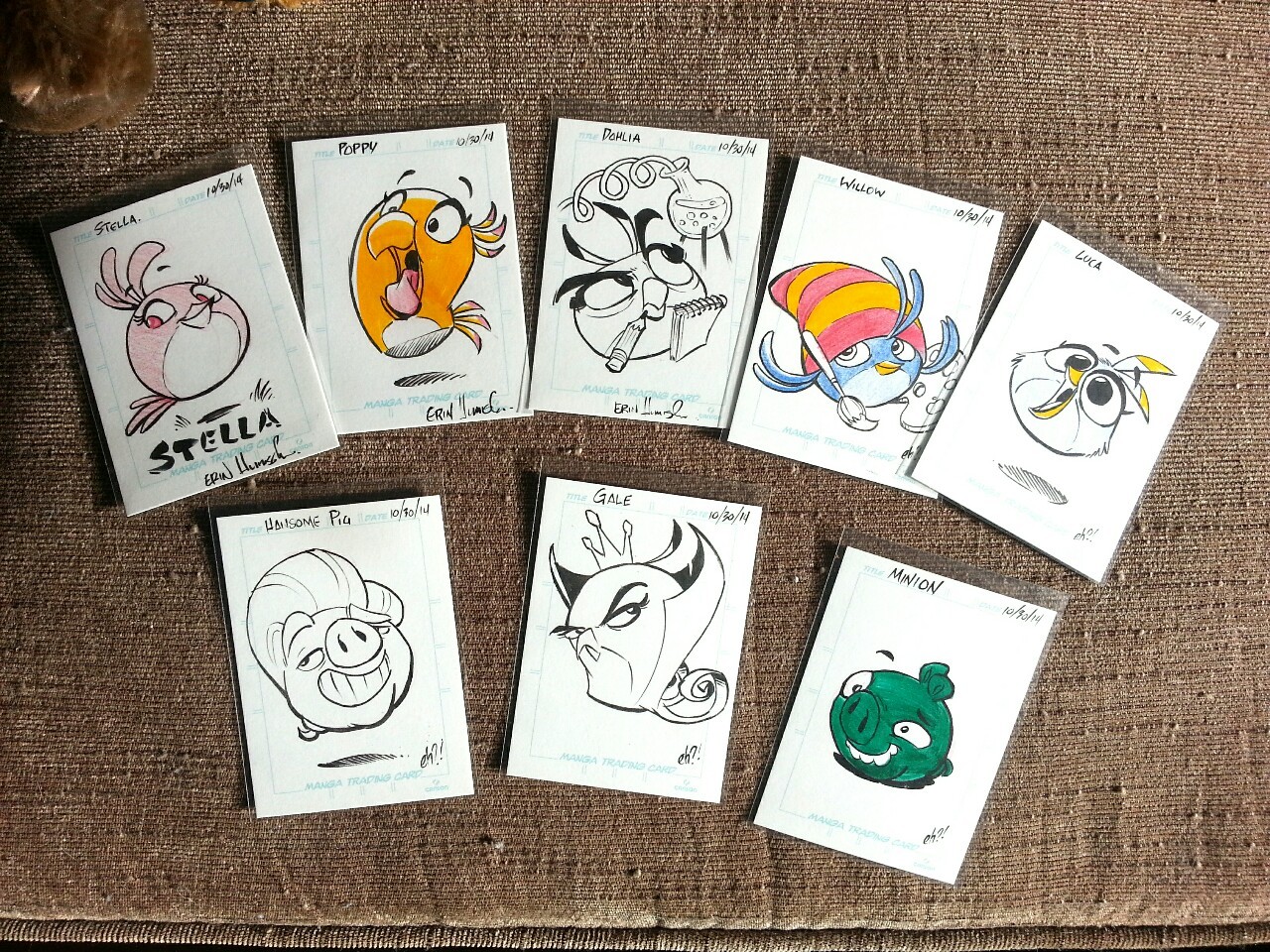 Eight small traditional drawings, each are:
-a coloured drawing of Stella
-a coloured drawing of Poppy
-a black and white drawing of Dahlia
-a coloured drawing of Willow
-a semi-coloured drawing of Luca (Only the yellow bits are coloured in)
-a black and white drawing of Handsome Pig
-a black and white drawing of Gale
-a coloured drawing of a minion pig