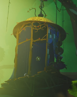A tall, grand,  purple tent thingy with a thatch roof resembling a straw hat(?)