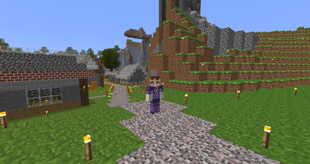 Franny's Minecraft character stands at the entrance to the same village.