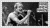 nine inch nails stamp, featuring a picture of the woodstock '94 concert