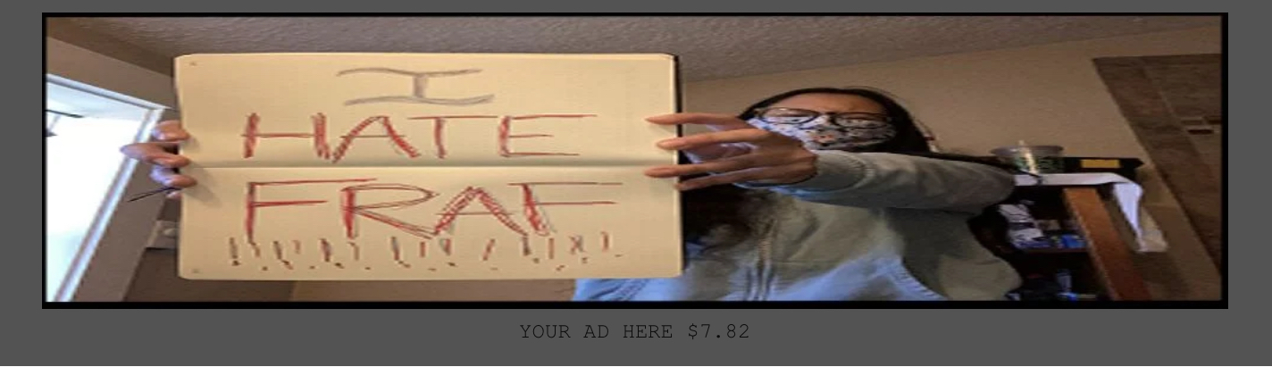 Person holding a paper sign that says “I HATE FRAF!!!!!!!”
