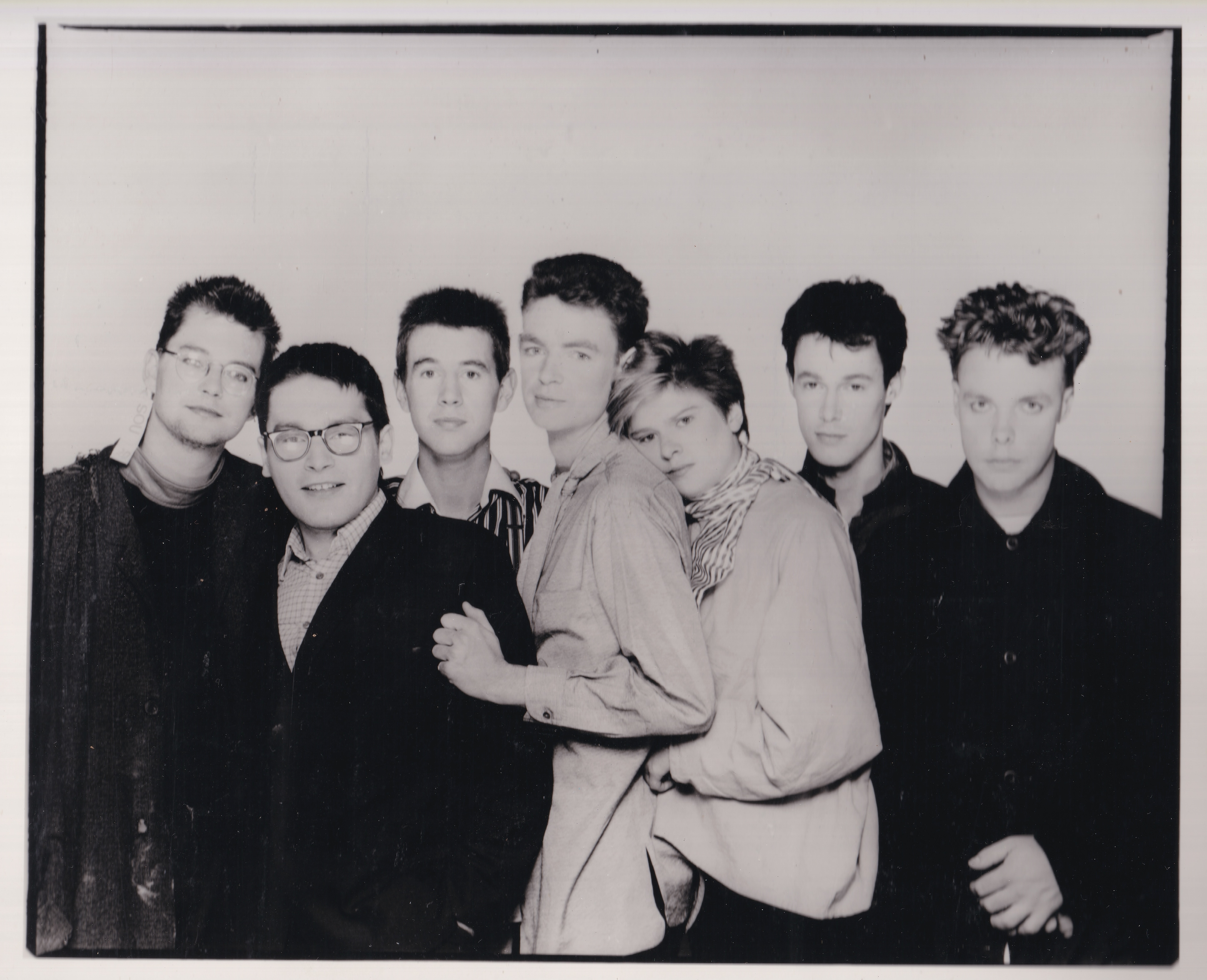 What Noise era 7 member band all standing against each other.