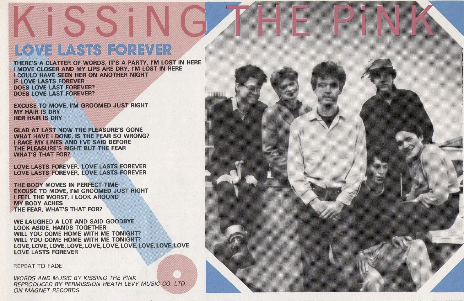 A black and white photo of the 6-member Naked lineup. Nick stands in the middle standing with a neutral expression on his face. Behind him is each member sitting on a wall and smiling. From left to right, Jon, Jo, Stevie, Peter and George.