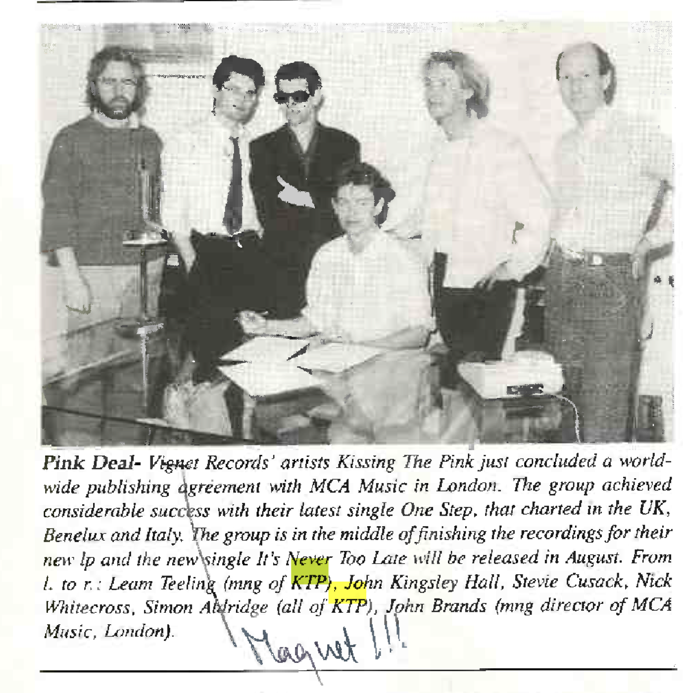 A photo of the CTAL era band next to two unenthused record executives. Nick sits down, signing a paper, while everybody else stands up