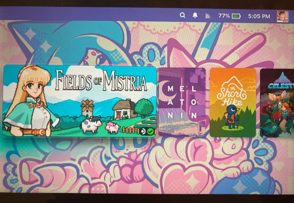 A photo of a Steam Deck's homepage, with a customized, minimalist theme and a Fairy-type Pokemon-themed background.