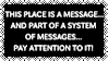a black stamp that cycles through the text of the This Is Not A Place Of Honor warning