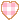 A heart with a plaid pattern in pale pink colours
