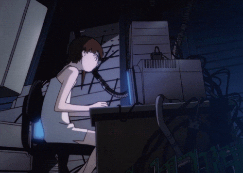 Lain sitting browsing on her computer.