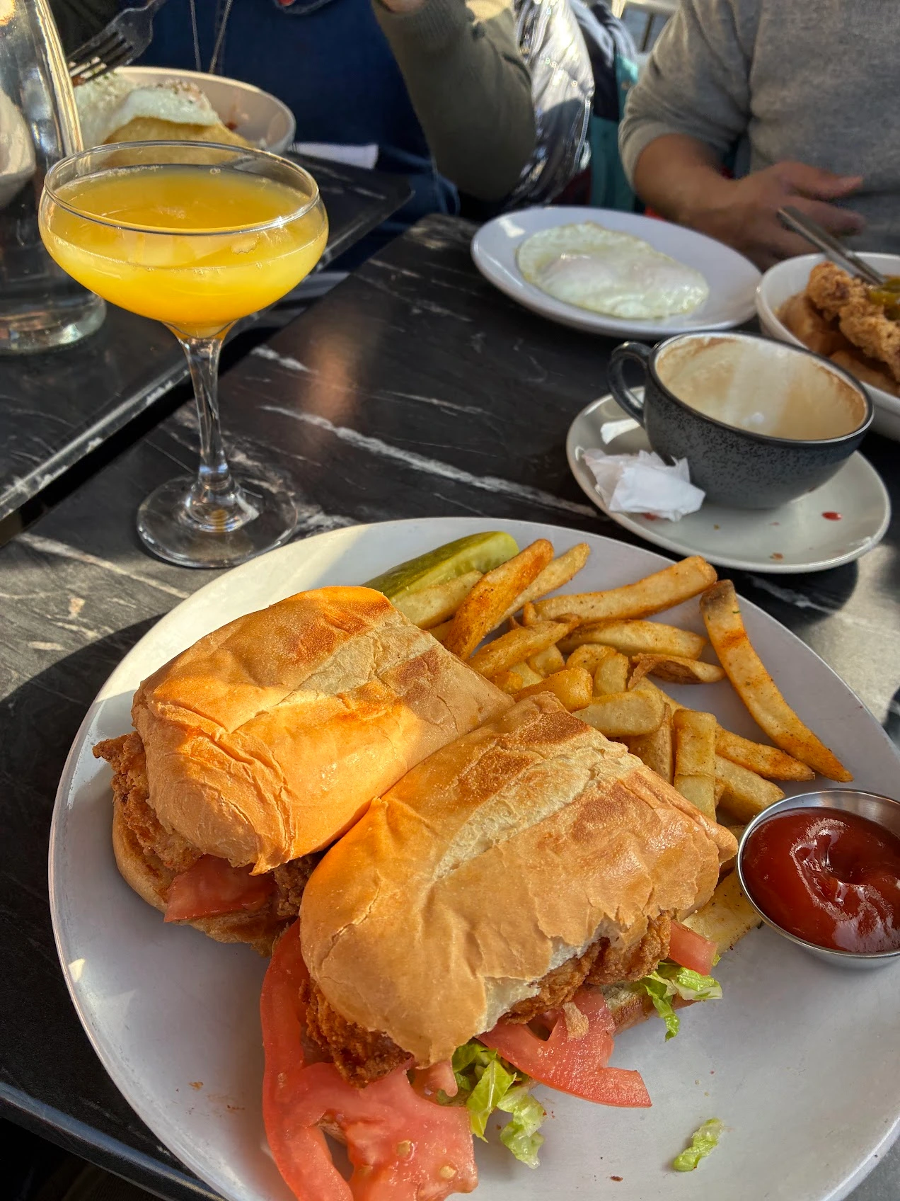 Mimosa and shrimp po' boy