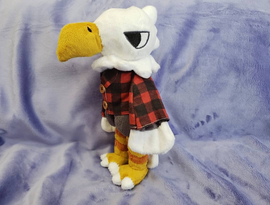 This was challenging for me when I was commissioned to make him, made him a little flannel jacket. I like how he came out, and he can stand.