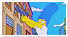 Marge pointing a handgun left