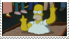 Homer flipping middle fingers while half stuck in a sandbox