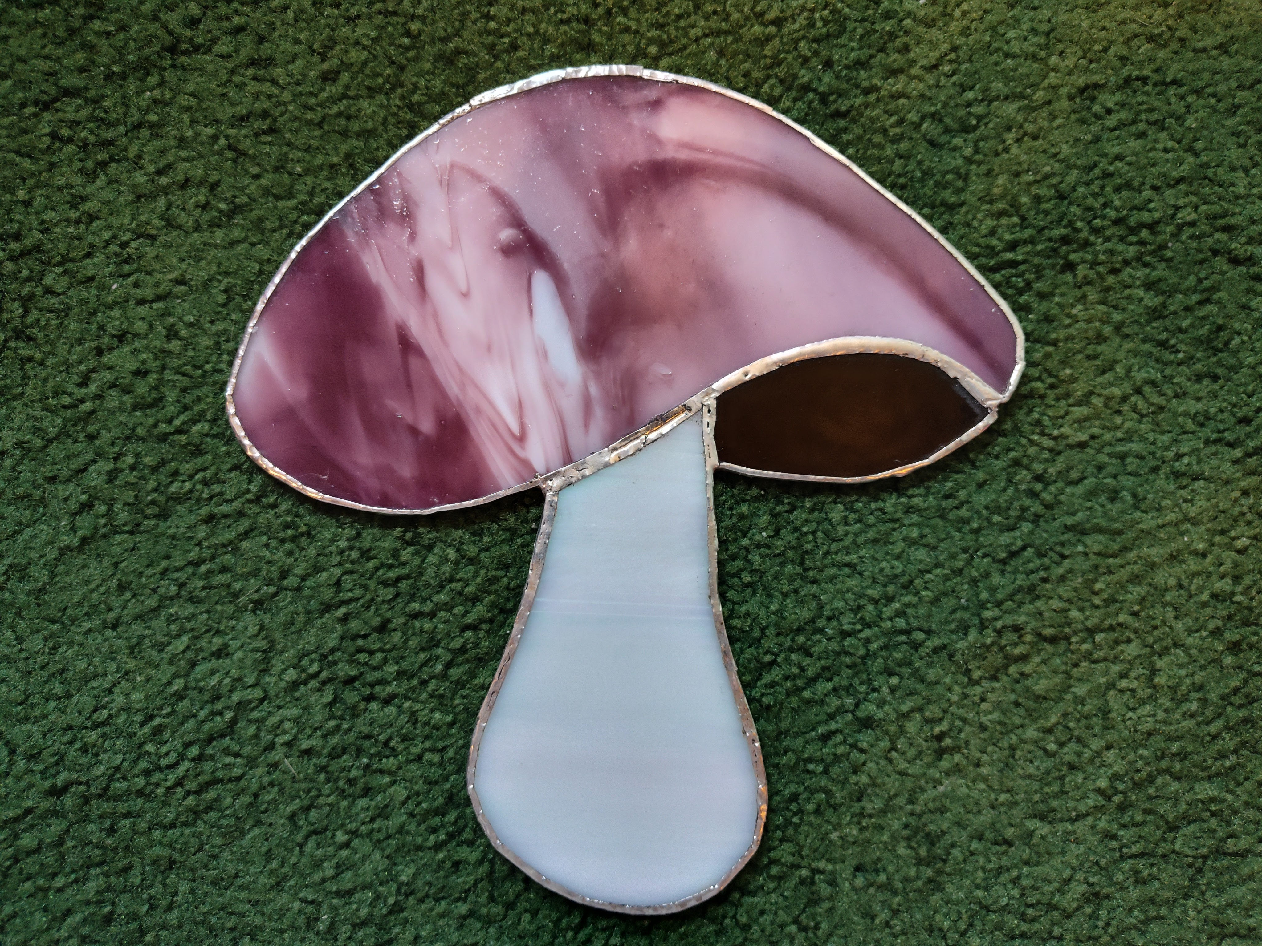 A purple stained glass mushroom.