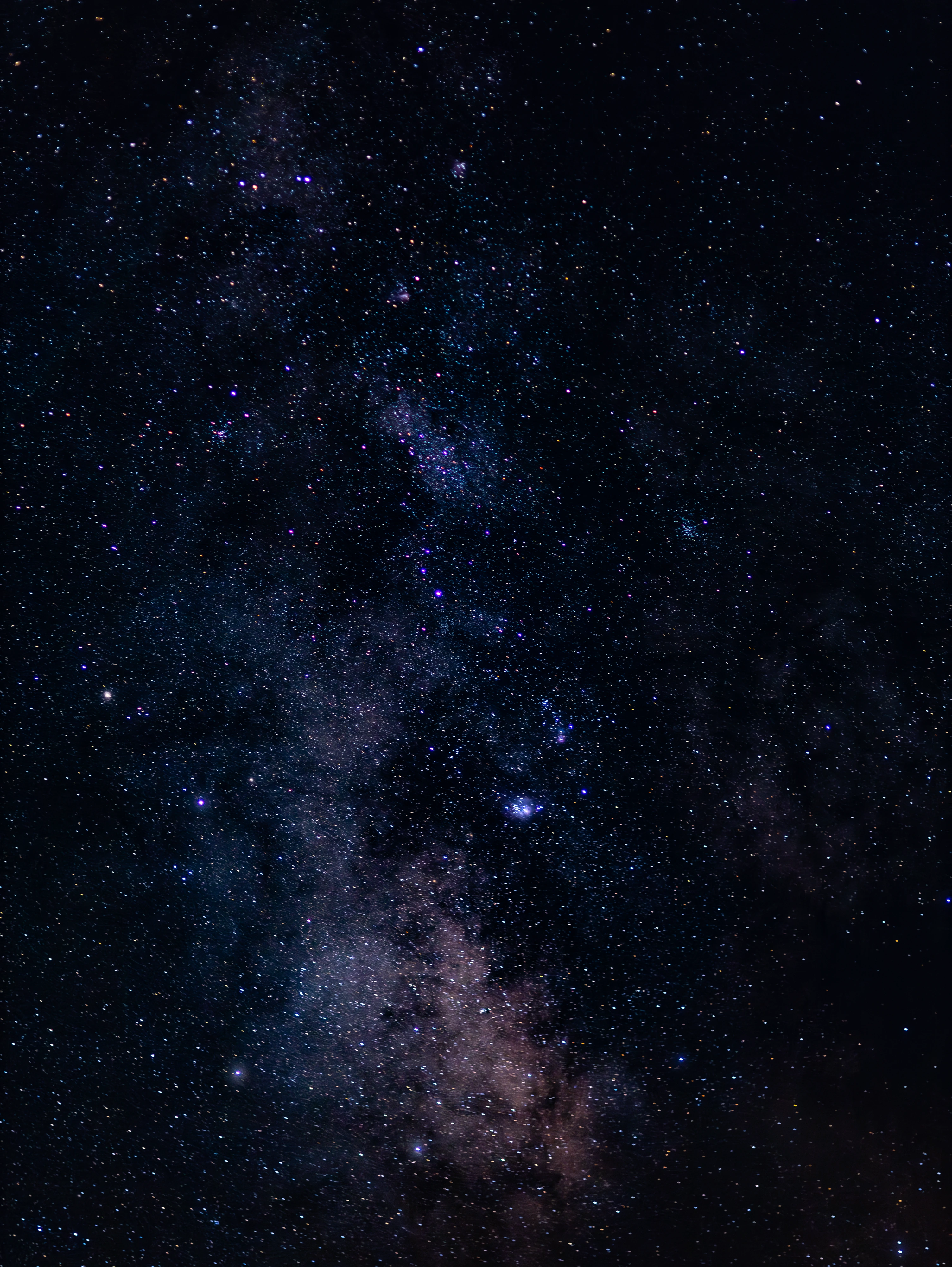 Blue-toned Milky Way stretching across the night sky