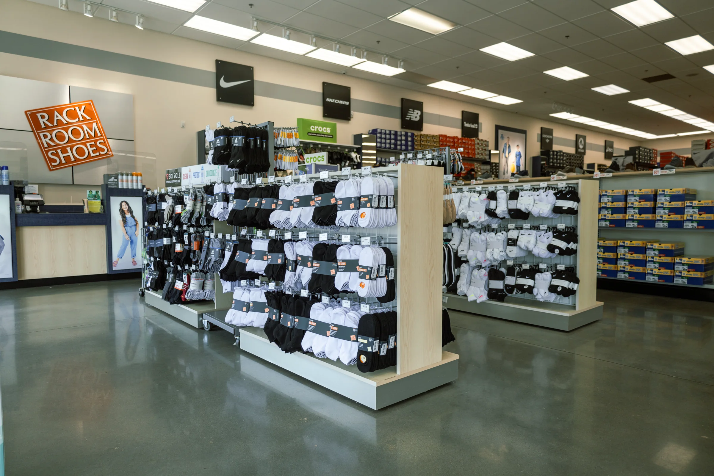 Merchandise fixtures across a Rack Room Shoes retail floor