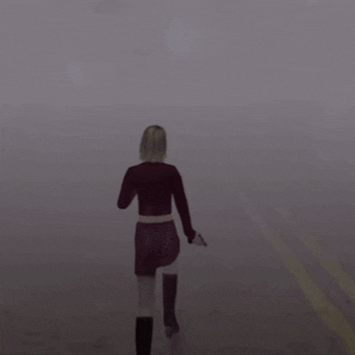 Silent Hill 2's Maria running through fog