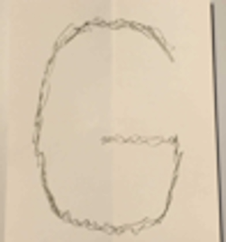 a semi-threateningly written capital letter g