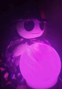 Yippee the Wizard, pondering the orb as it shifts colors