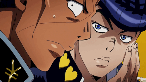 Josuke whispering into Okuyasu's ear