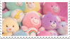 A pile of care bears plush.