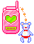A pink flip phone with a green heart and a white teddy bear charm.