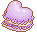 A purple heart shaped macaron.