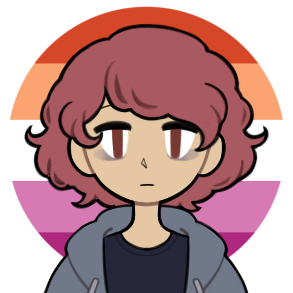 tired butch in hoodie standing in front of lesbian pride flag