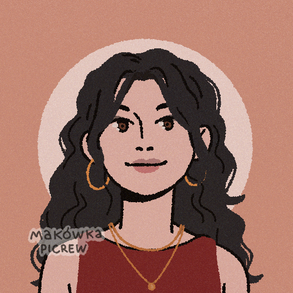 woman with wavy hair and golden jewelry