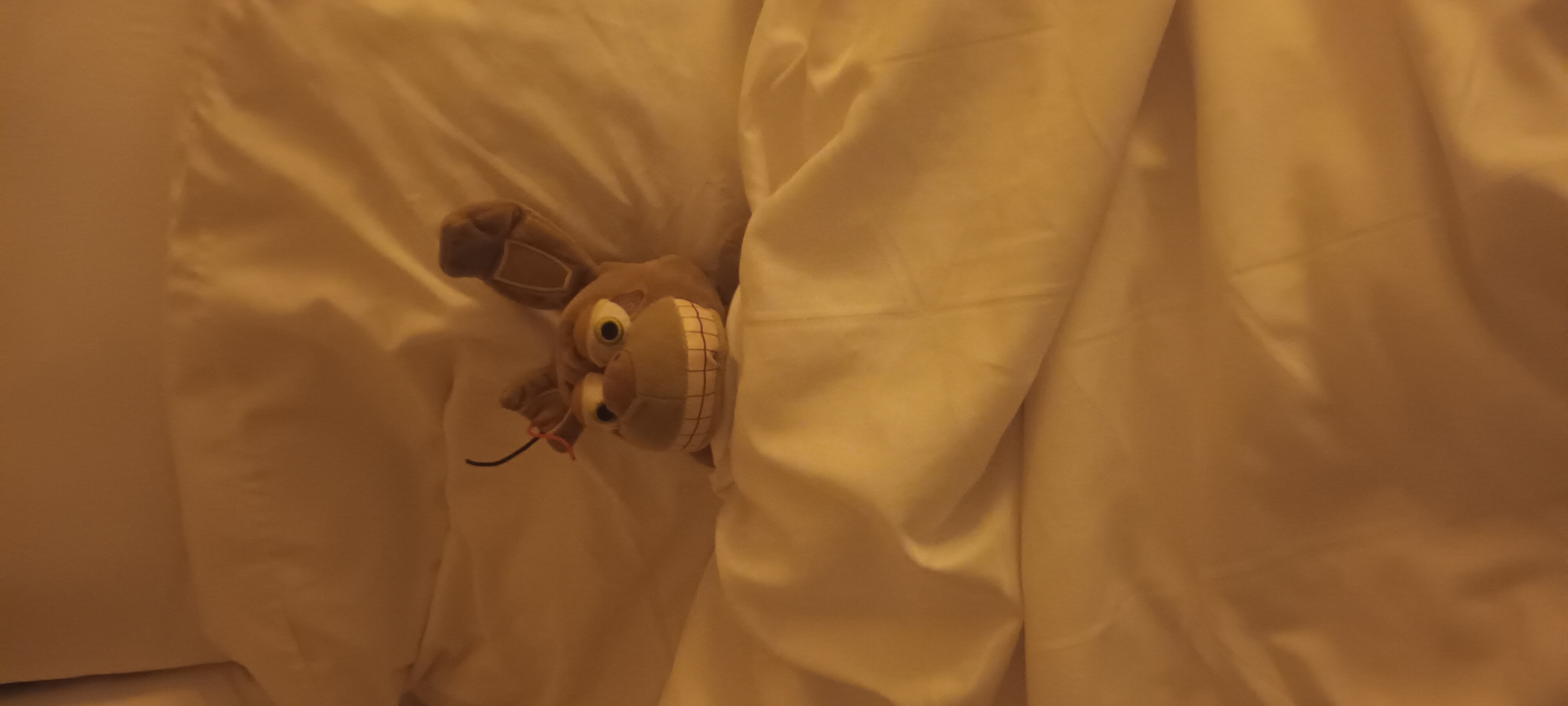 Springtrap tucked into the hotel's bed