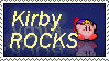 Kirby using the rock copy ability with the text saying 'Kirby rocks'