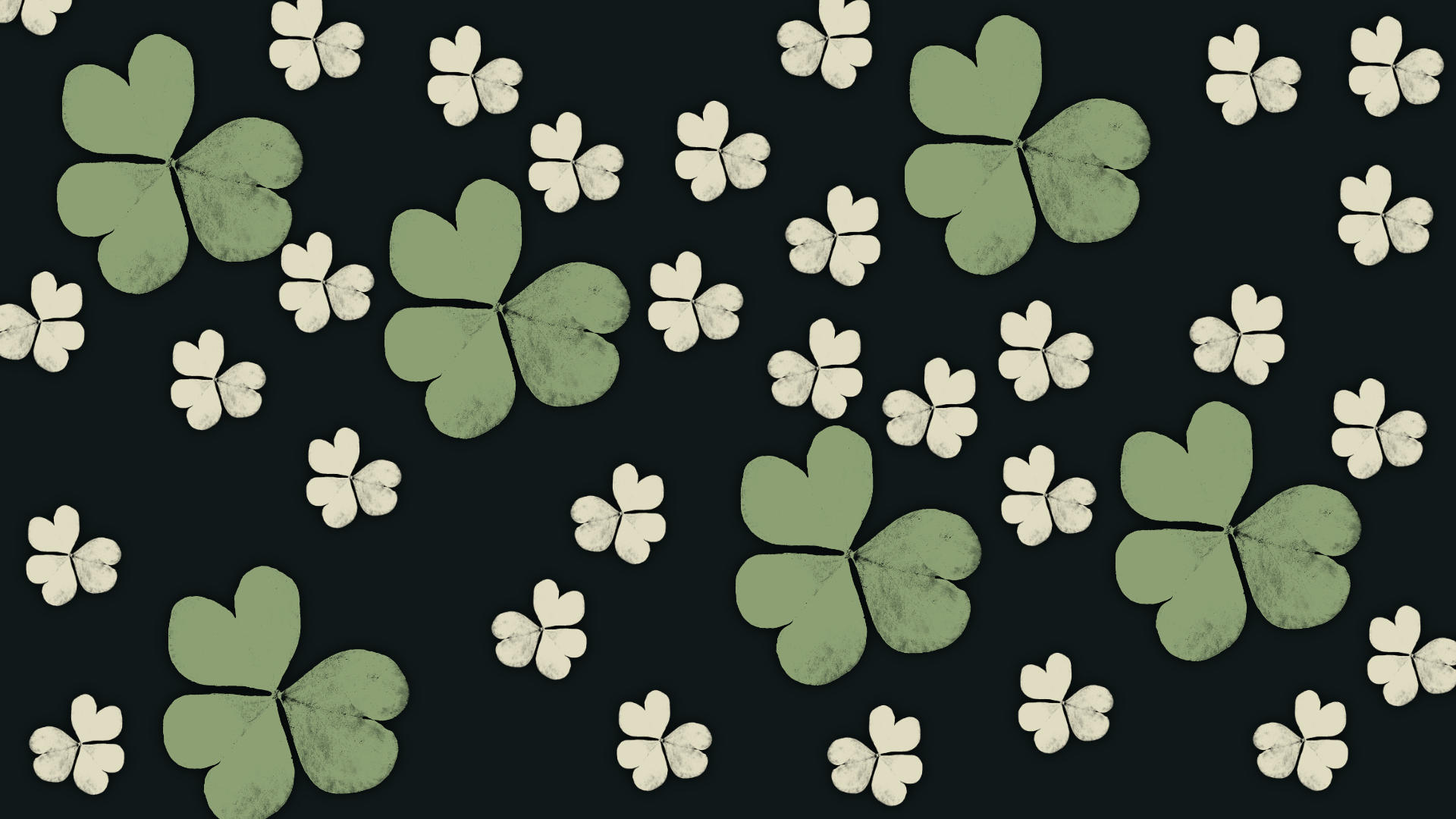 a dark green background with cream and light green colored flowers