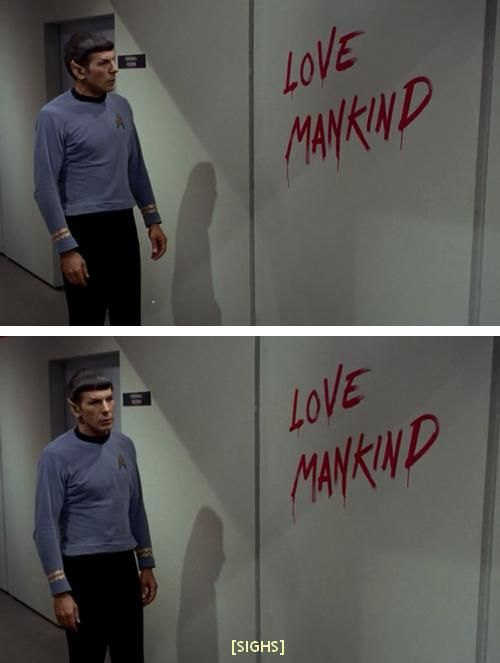 spock from star trek standing in front of a wall that says: LOVE MANKID