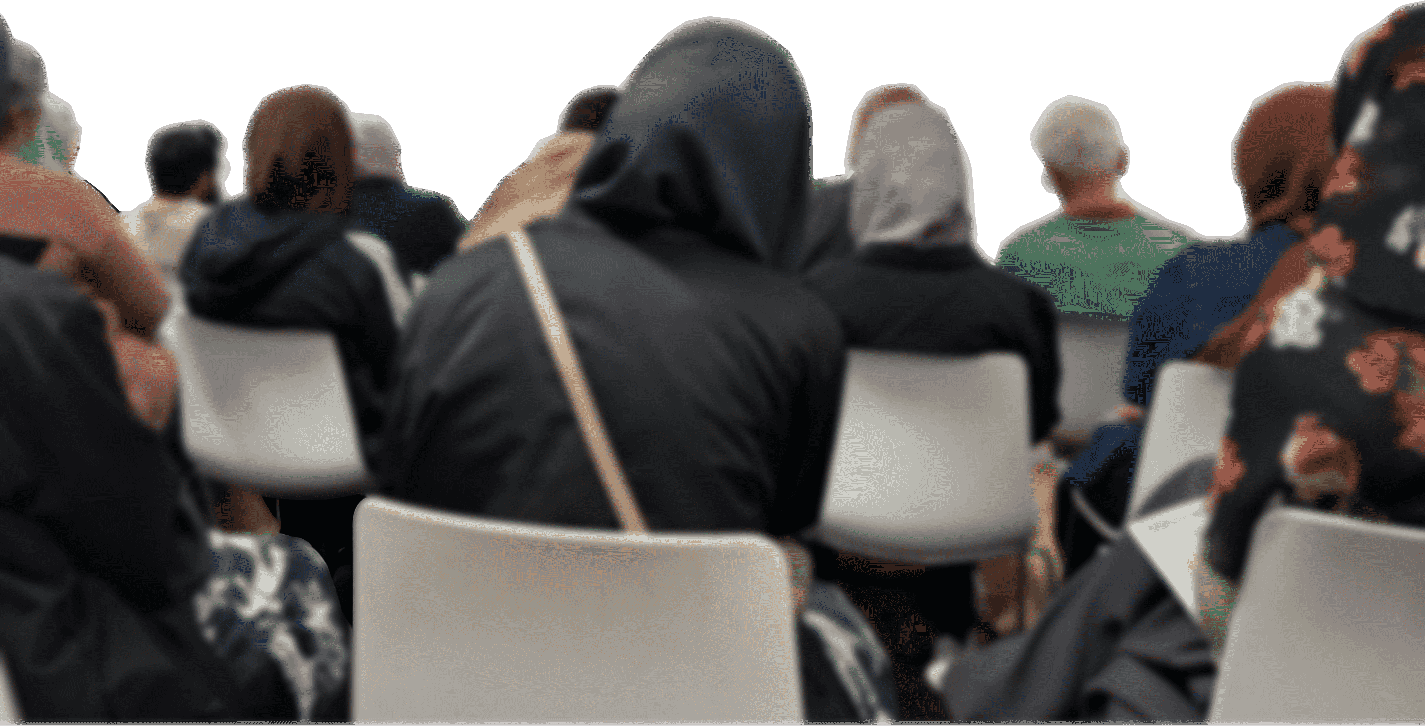 blurred image of people's backs during the panel