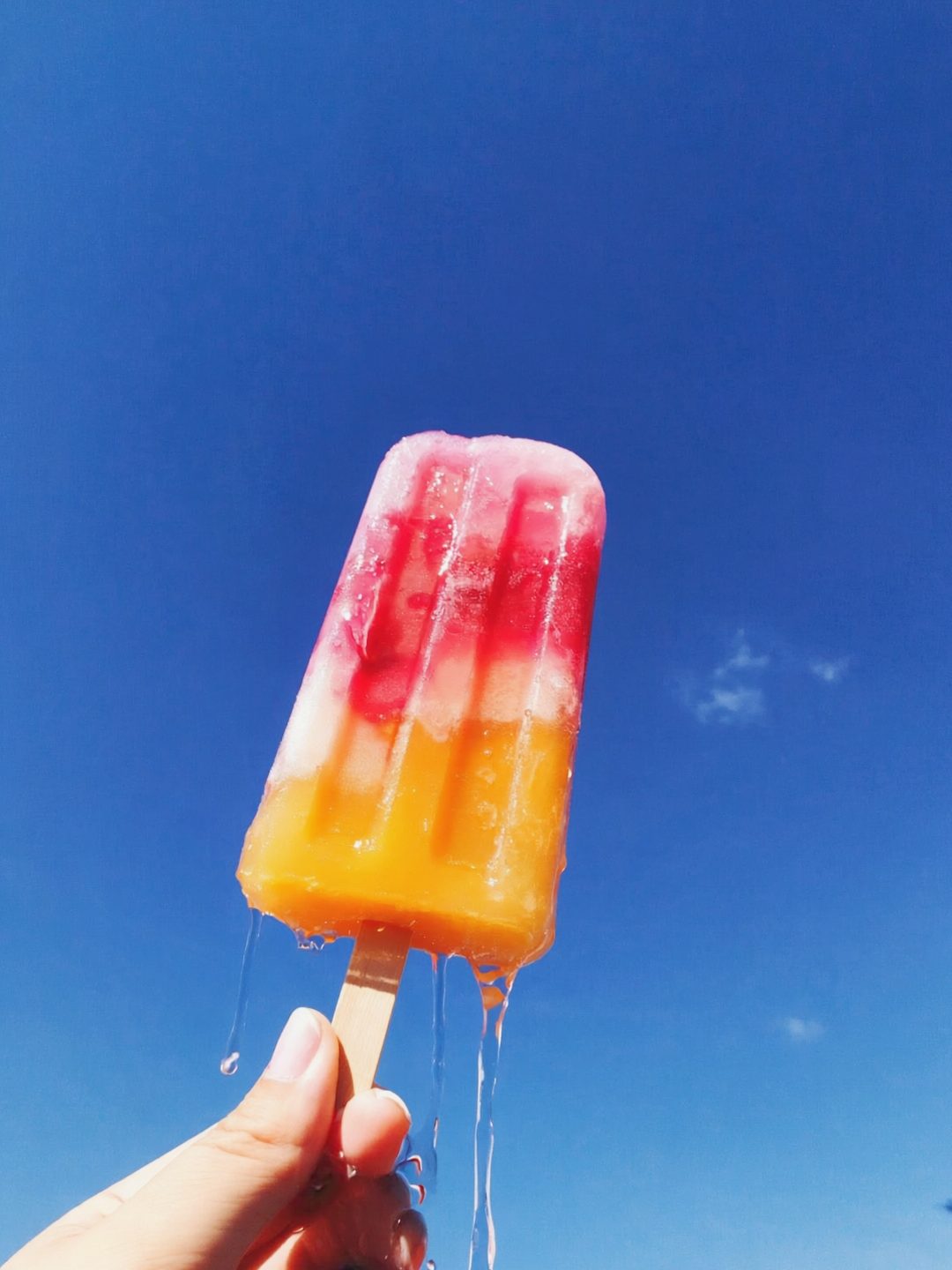 Melting Summer Fruit Pop Against Sky