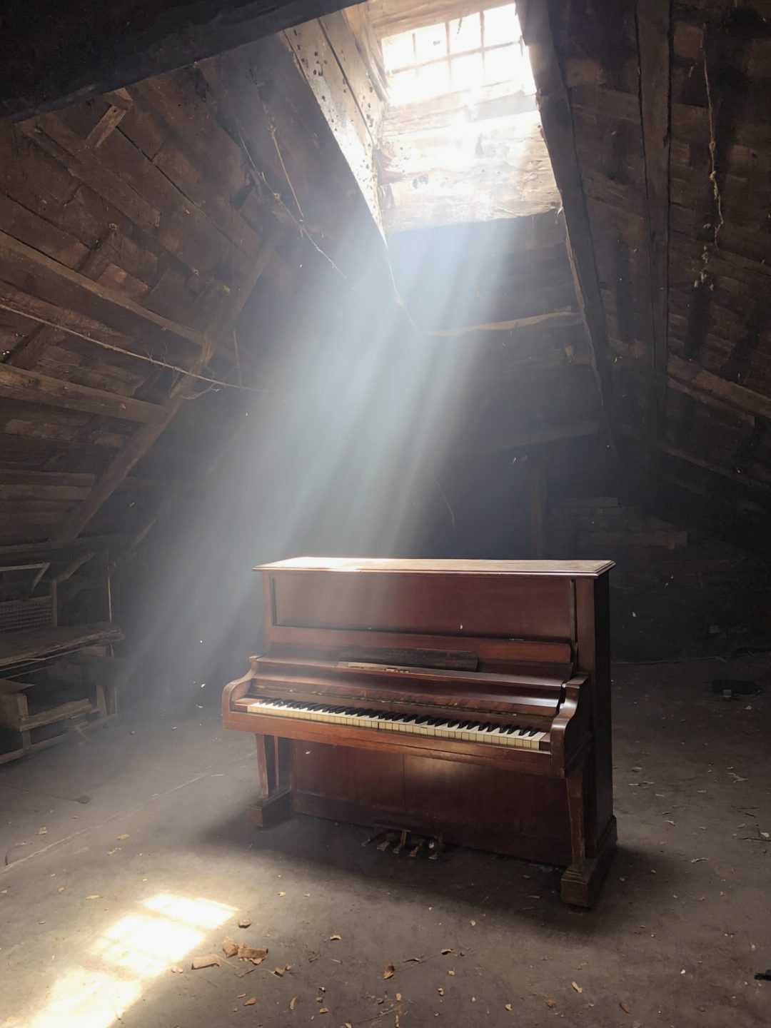 Sunlight Piercing Through Dusty Attic