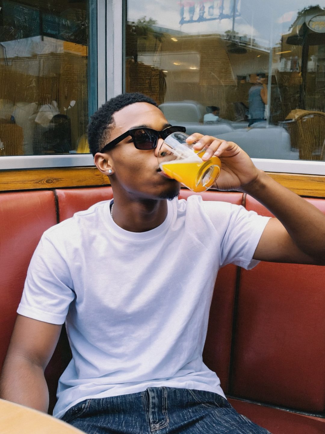 Candid Summer Refreshment In Diner